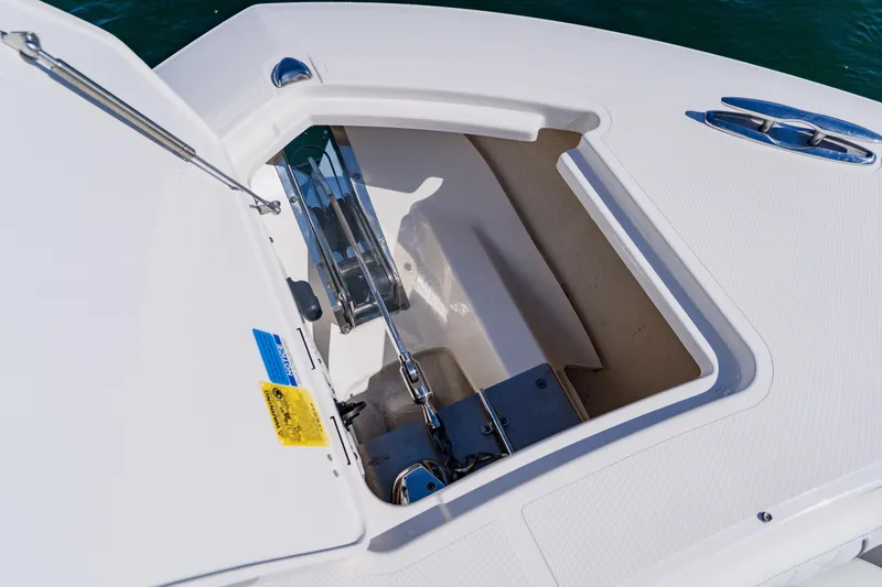 Slide: The Image of 2022 Pursuit S 378 Sport boat anchor compartment detail. - 10