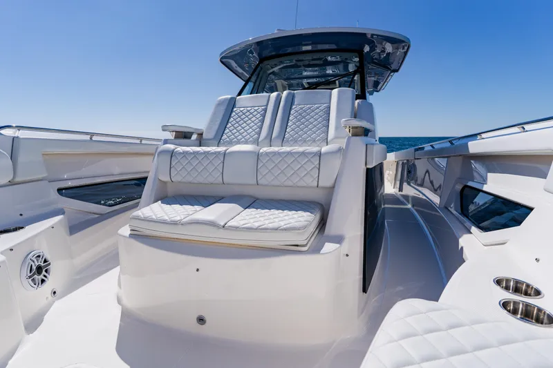 Slide: The Image of Luxurious 2022 Pursuit S 378 Sport boat interior with plush seating and sleek design. - 15
