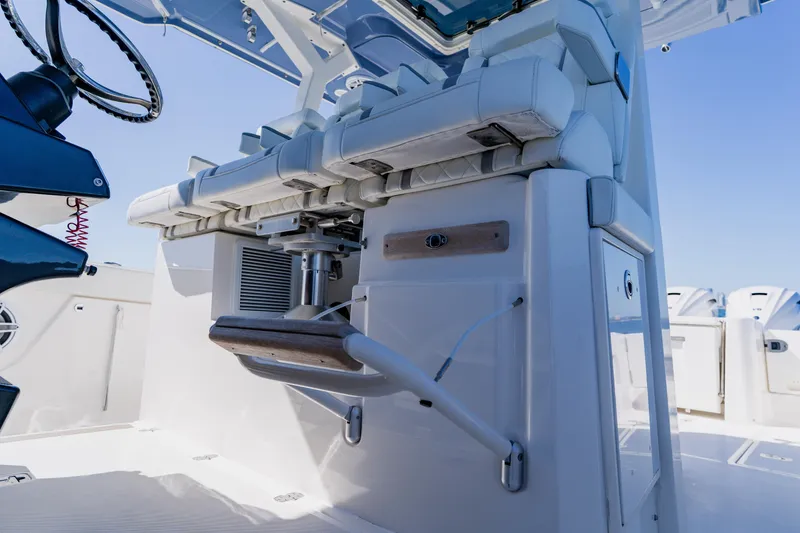 Slide: The Image of 2022 Pursuit S 378 Sport boat interior with helm and seating area. - 22