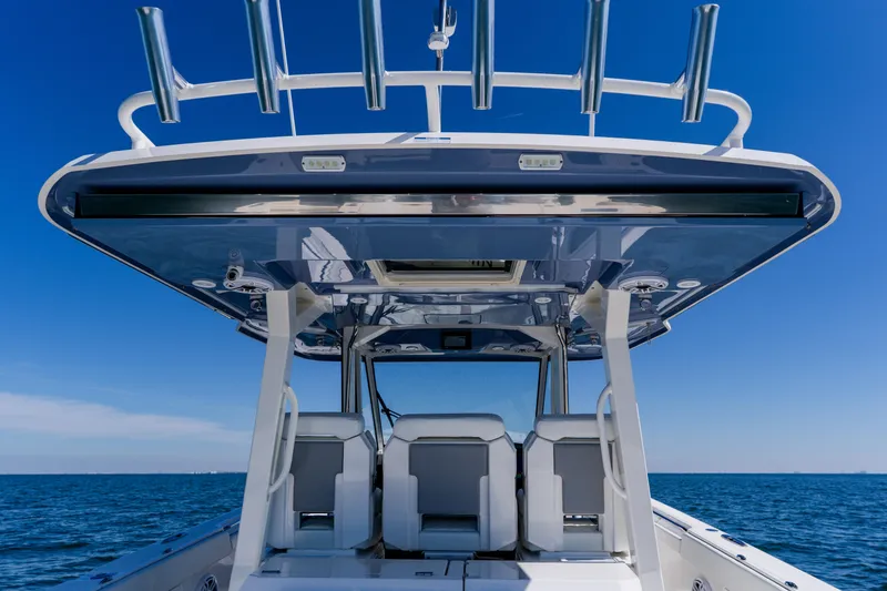 Slide: The Image of 2022 Pursuit S 378 Sport boat with sleek design on open water. - 29