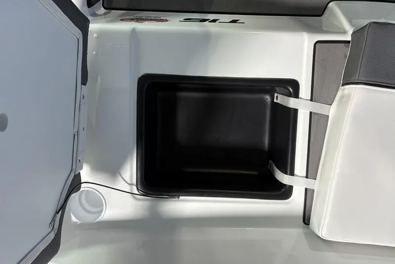 Slide: The Image of Interior view of 2026 Tahoe T16 boat storage compartment and seating area. - 18