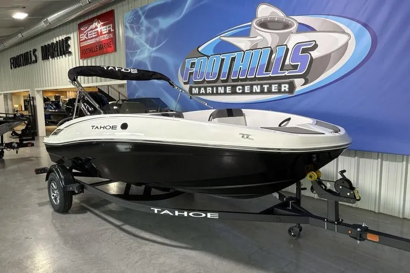 Slide: The Image of 2026 Tahoe T16 boat displayed at Foothills Marine Center showroom. - 4