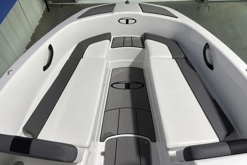 Slide: The Image of 2026 Tahoe T16 boat interior with sleek seating and modern design. - 9