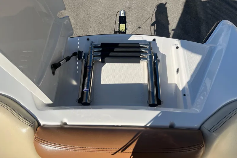 Slide: The Image of 2016 MasterCraft X23 boat with folded stainless steel swim ladder on deck. - 14