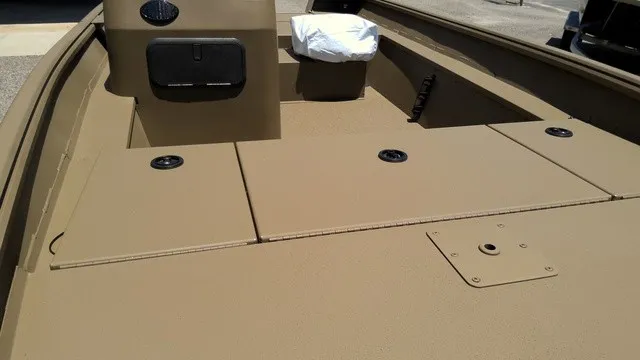 Slide: The Image of The image shows the deck of a 2025 G3 Gator Tough 17 SC boat with storage compartments. - 7