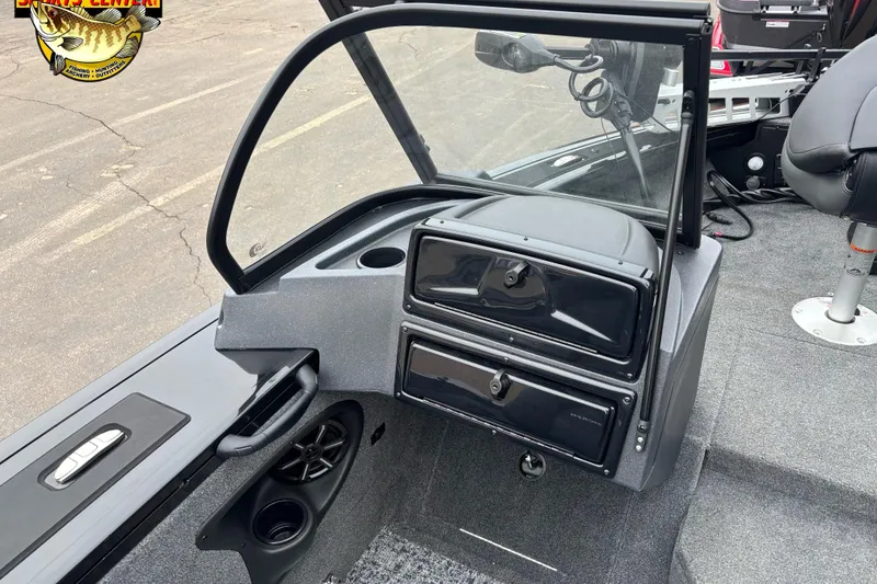 Slide: The Image of 2026 Tracker Targa V-18 WT boat interior with dashboard and seating. - 6