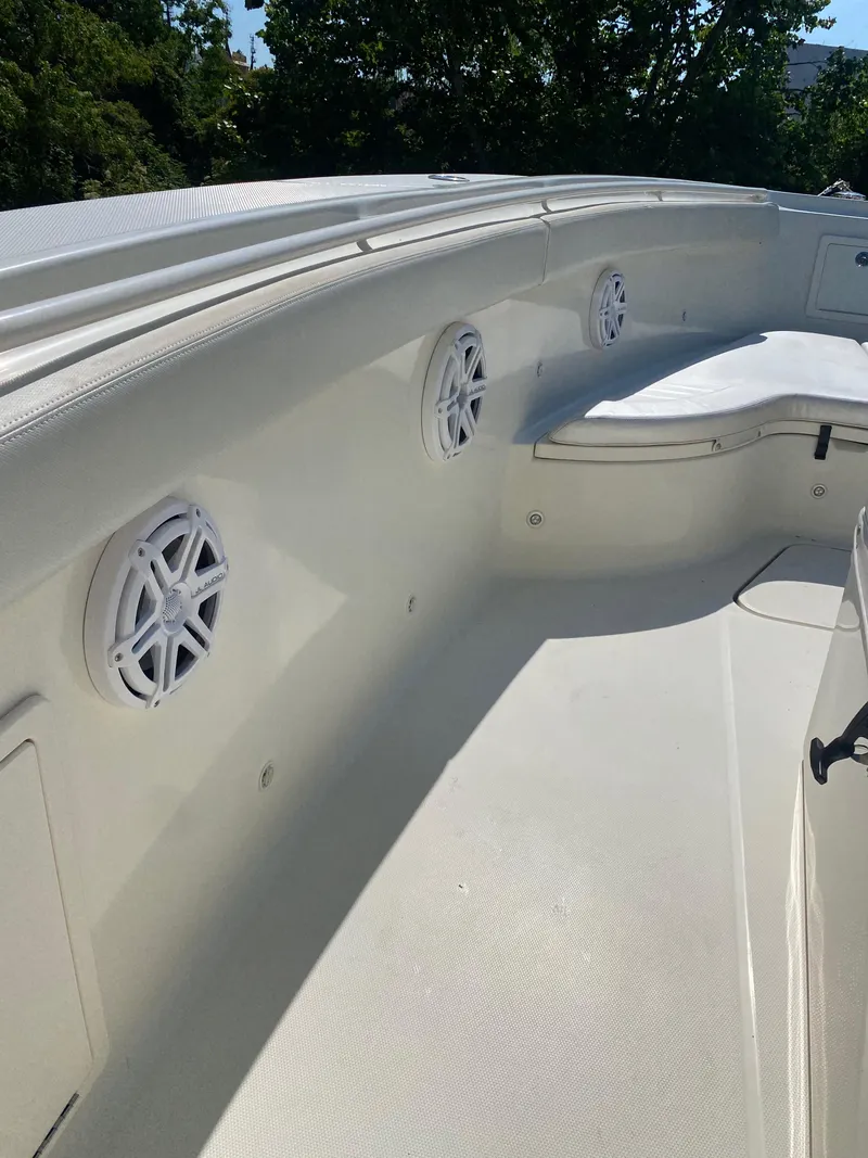 Slide: The Image of 2017 Hydra-Sports 3400 Center Console audio control panel on boat interior. - 17