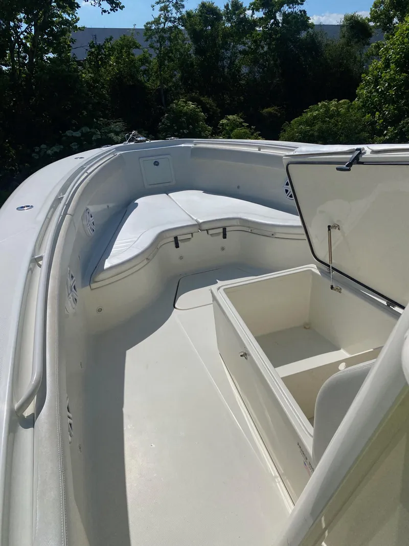 Slide: The Image of 2017 Hydra-Sports 3400 Center Console boat interior with seating and storage. - 19