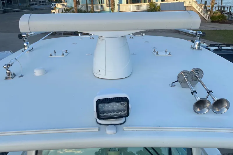 Slide: The Image of 2017 Hydra-Sports 3400 Center Console storage compartment with stainless steel fittings. - 23