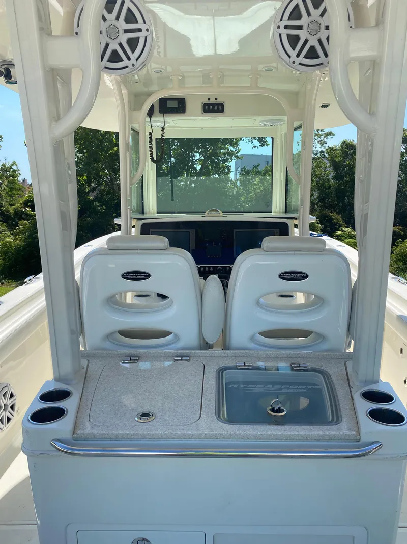 Slide: The Image of 2017 Hydra-Sports 3400 Center Console boat with open storage compartments. - 6