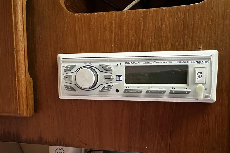 Slide: The Image of 1997 Luhrs 32 Open boat stereo system, Dual MXD378SXM, with Bluetooth and USB connectivity. - 39