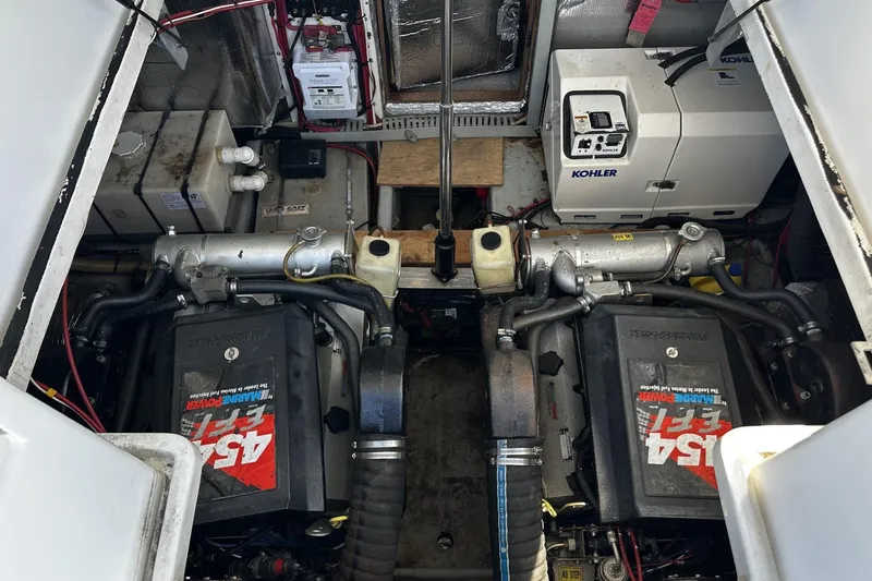 Slide: The Image of Engine room of a 1997 Luhrs 32 Open boat with twin engines and Kohler generator. - 43