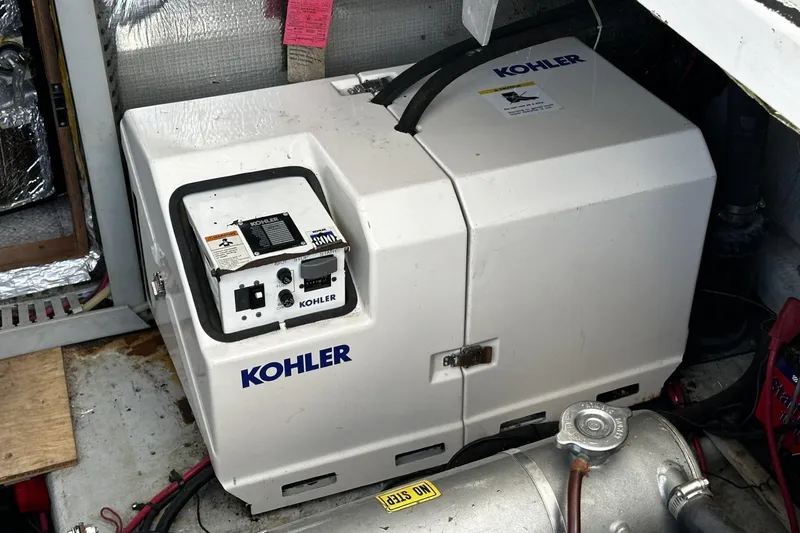 Slide: The Image of Kohler generator in 1997 Luhrs 32 Open boat engine room. - 45