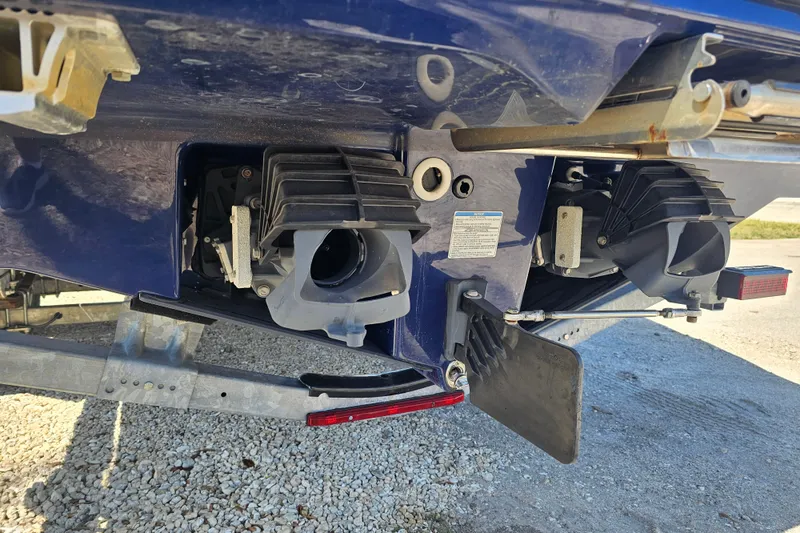 Slide: The Image of Rear view of a 2022 Yamaha Boats 252SD jet propulsion system. - 5
