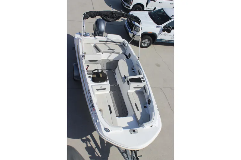 Slide: The Image of 2021 Hurricane SunDeck Sport 185 OB boat, aerial view, parked on concrete. - 12