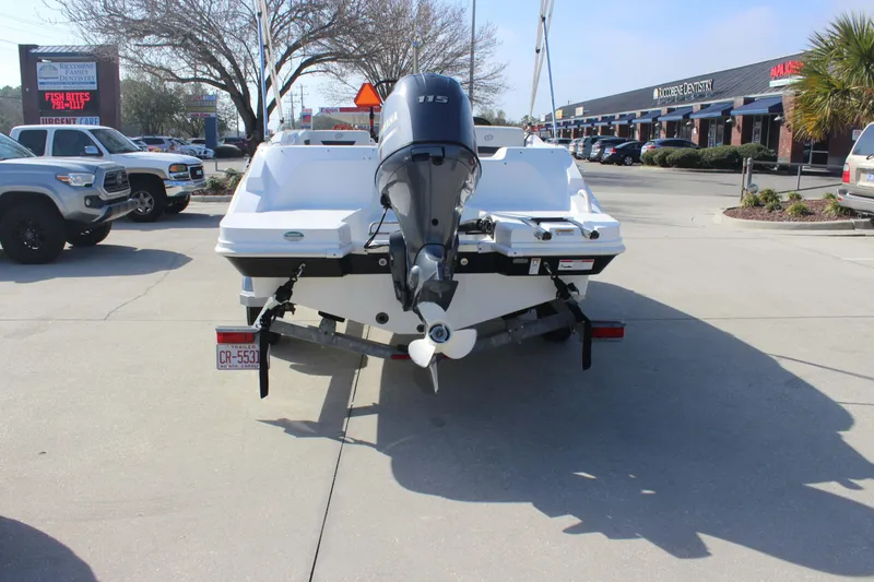 Slide: The Image of 2021 Hurricane SunDeck Sport 185 OB boat on trailer, rear view in parking lot. - 8