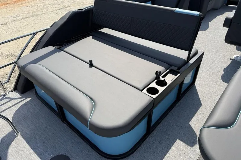 Slide: The Image of 2026 Godfrey Sweetwater 2286 SFL boat seating with cup holders and sleek design. - 11