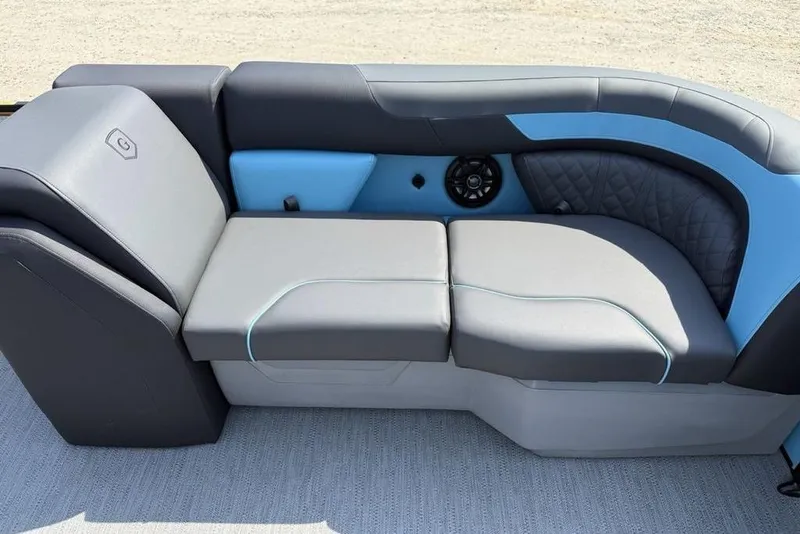 Slide: The Image of 2026 Godfrey Sweetwater 2286 SFL boat seating with modern design and blue accents. - 13
