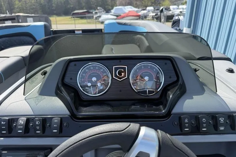 Slide: The Image of Dashboard of 2026 Godfrey Sweetwater 2286 SFL pontoon boat with gauges and controls. - 18