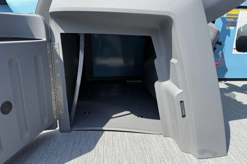 Slide: The Image of Open storage compartment on 2026 Godfrey Sweetwater 2286 SFL boat, showcasing interior space. - 20