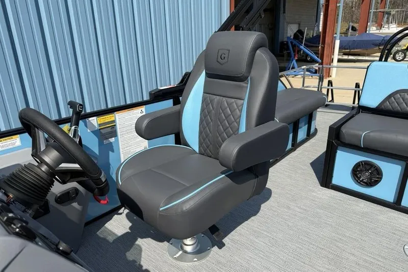 Slide: The Image of Captain's chair on 2026 Godfrey Sweetwater 2286 SFL pontoon boat, featuring sleek design and comfort. - 28
