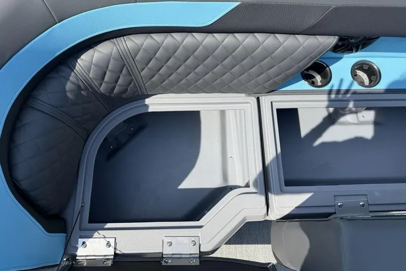 Slide: The Image of Interior storage compartments of 2026 Godfrey Sweetwater 2286 SFL boat with quilted seating. - 29