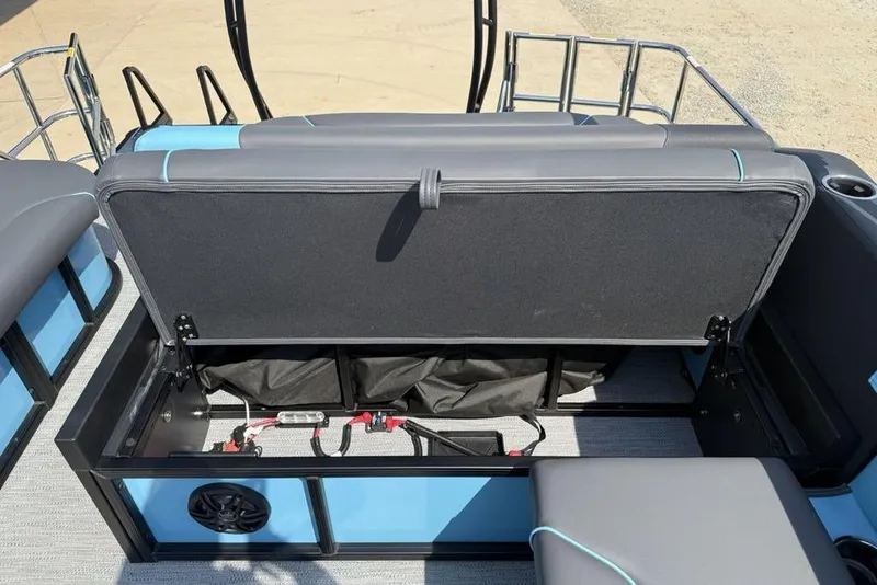 Slide: The Image of 2026 Godfrey Sweetwater 2286 SFL boat interior with open storage compartment. - 32