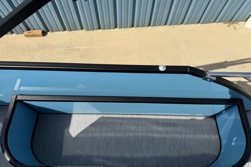 Slide: The Image of Overhead view of 2026 Godfrey Sweetwater 2286 SFL boat interior with blue and black accents. - 7