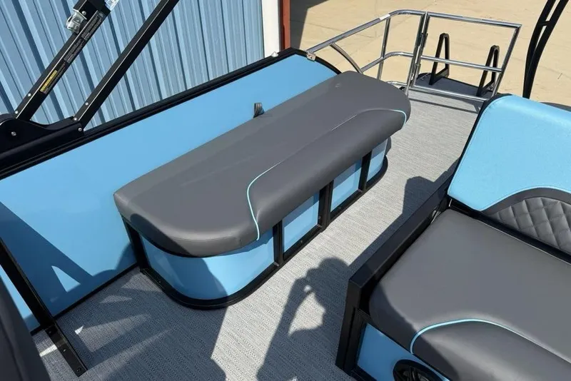 Slide: The Image of 2026 Godfrey Sweetwater 2286 SFL boat interior with blue and gray seating. - 8