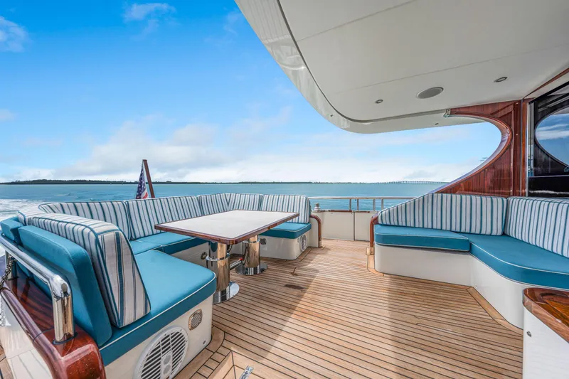 Slide: The Image of Luxurious 2021 Steeler 60S Performance yacht deck with elegant seating and ocean view. - 15