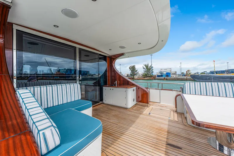 Slide: The Image of Luxurious 2021 Steeler 60S Performance yacht deck with seating and waterfront view. - 17