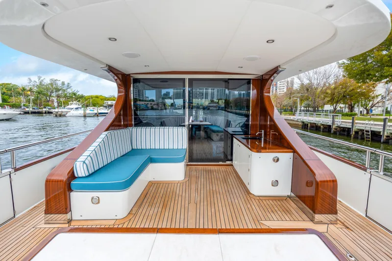 Slide: The Image of Luxurious 2021 Steeler 60S Performance yacht deck with seating and waterfront view. - 26