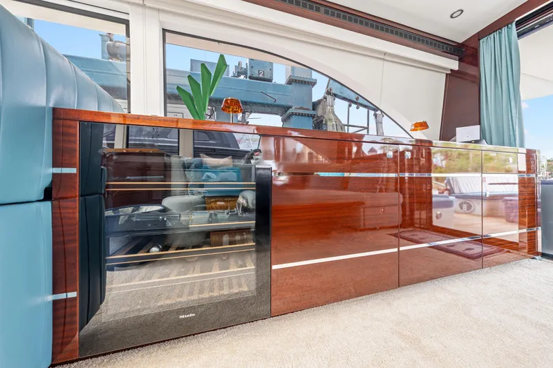 Slide: The Image of Luxurious interior of 2021 Steeler 60S Performance yacht with sleek wood cabinetry and modern design. - 32