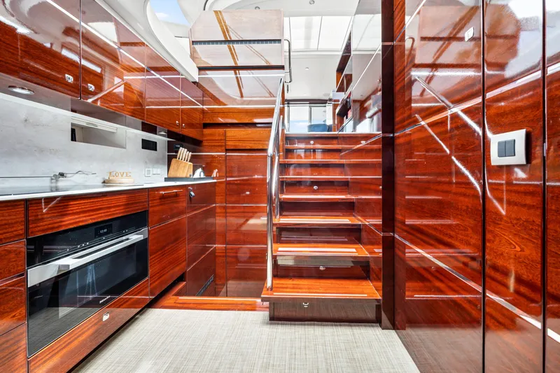 Slide: The Image of Luxurious interior of 2021 Steeler 60S Performance yacht with sleek wooden finishes. - 36