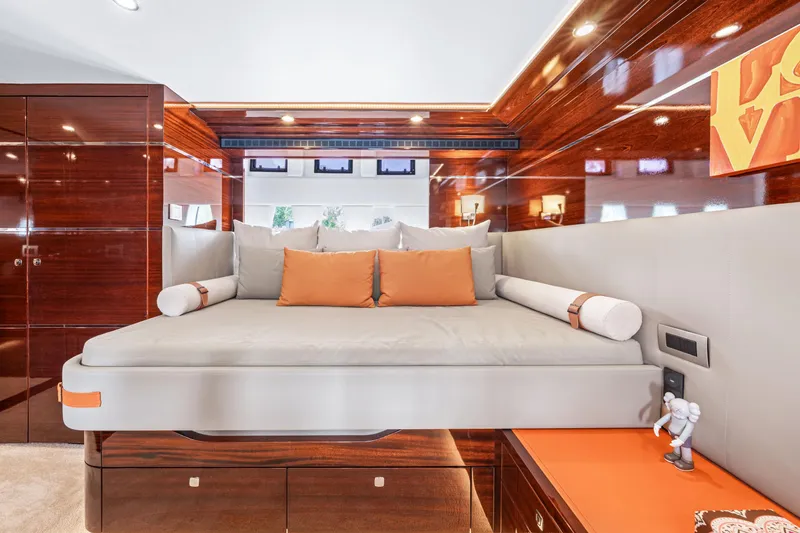 Slide: The Image of Luxurious interior of 2021 Steeler 60S Performance yacht with elegant wood finishes and plush bedding. - 43
