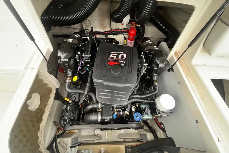 Slide: The Image of Engine compartment of a 2004 Sea Ray 220 Sundeck with MerCruiser 5.0 MPI engine. - 33