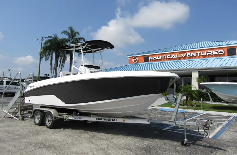 Slide: The Image of 2024 Wellcraft 202 Fisherman boat on trailer at Nautical Ventures dealership. - 1