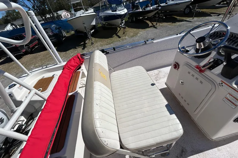 Slide: The Image of 2020 Carolina Skiff 178 DLV boat interior with steering console and seating. - 11