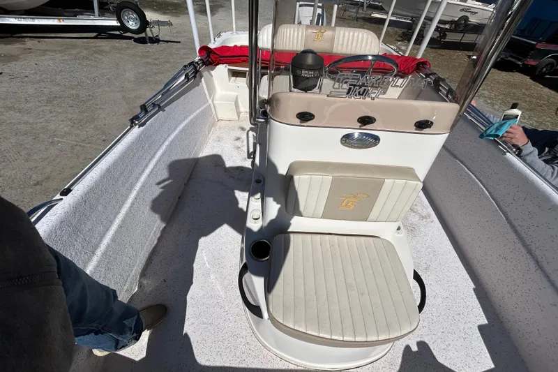 Slide: The Image of 2020 Carolina Skiff 178 DLV boat interior with seating and console. - 17
