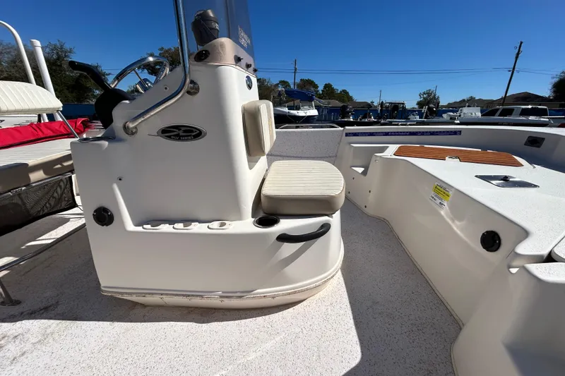 Slide: The Image of 2020 Carolina Skiff 178 DLV boat interior with steering console and seating. - 8