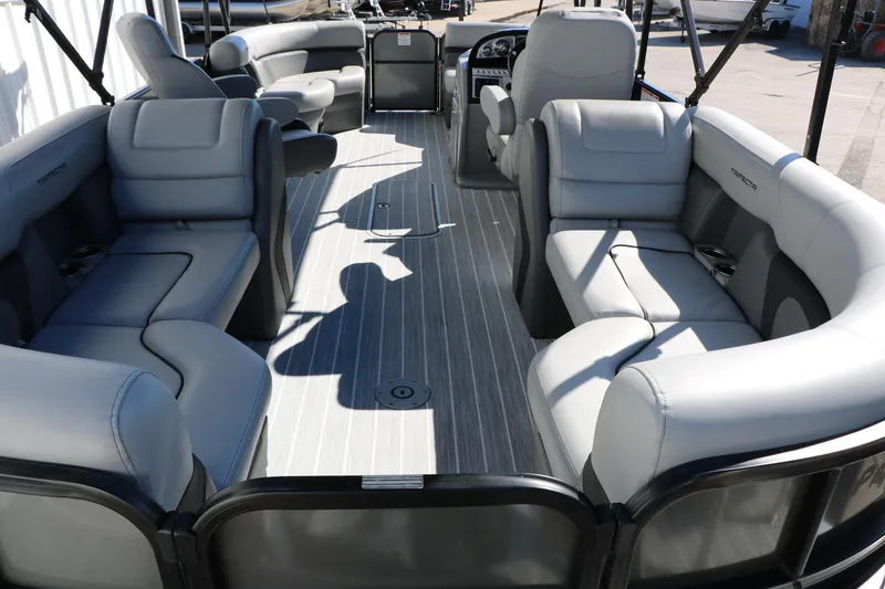 Slide: The Image of 2023 Trifecta 22 RFC pontoon boat interior with luxurious gray seating and spacious layout. - 26
