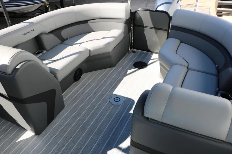 Slide: The Image of Luxurious interior of 2023 Trifecta 22 RFC pontoon boat with plush seating. - 42