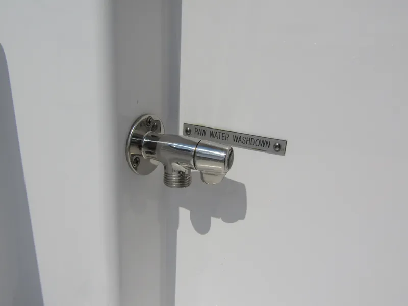 Slide: The Image of 2024 Wellcraft 202 Fisherman raw water washdown outlet. - 25