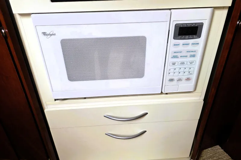 Slide: The Image of Built-in Whirlpool microwave in 1999 Fairline Targa 43 yacht kitchen. - 15
