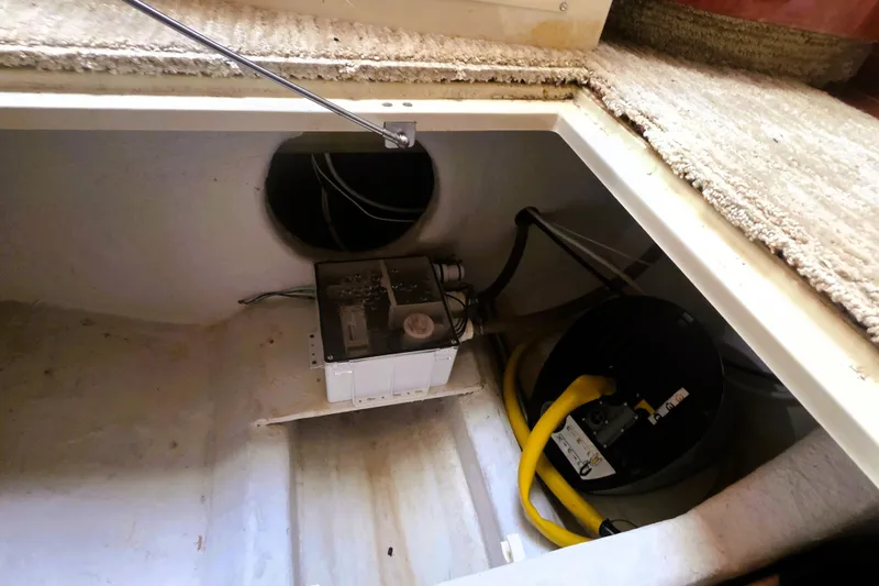 Slide: The Image of 1999 Fairline Targa 43 engine compartment with wiring and equipment. - 25