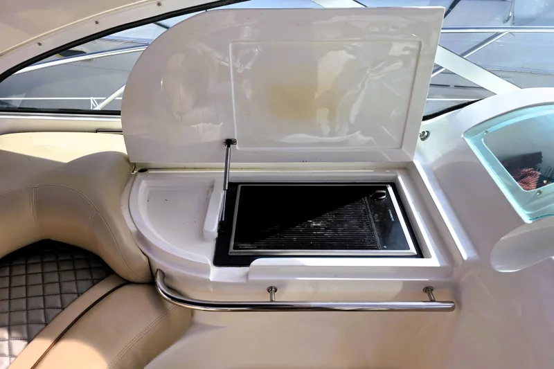 Slide: The Image of Luxury yacht Fairline Targa 43 (1999) interior with built-in grill and seating area. - 34