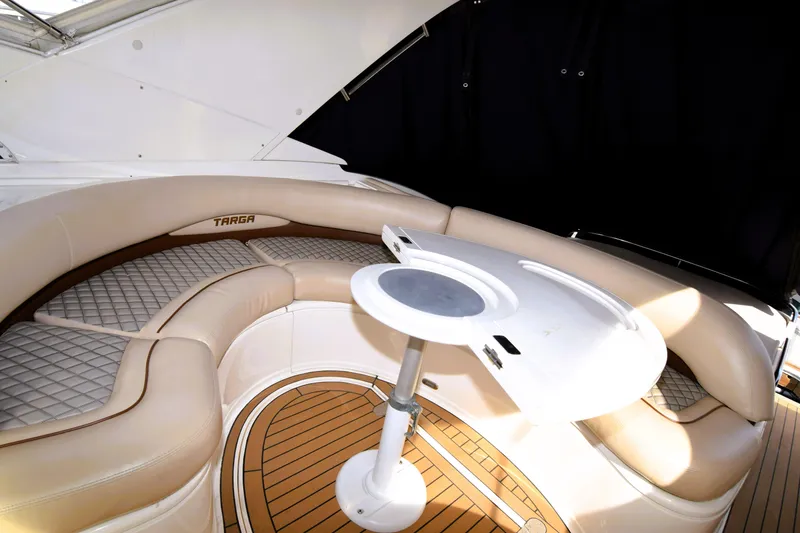 Slide: The Image of Luxurious seating area on a 1999 Fairline Targa 43 yacht with elegant design. - 38
