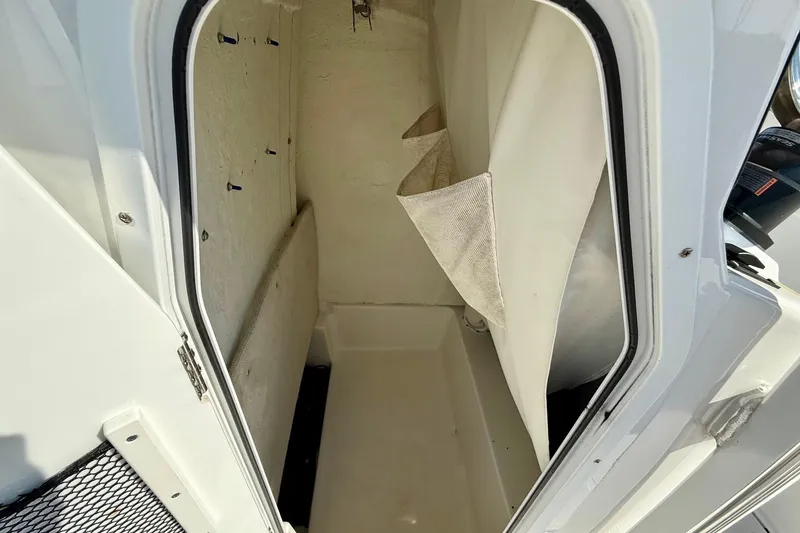 Slide: The Image of 2017 Sea Hunt BX 22 BR boat storage compartment interior view. - 14