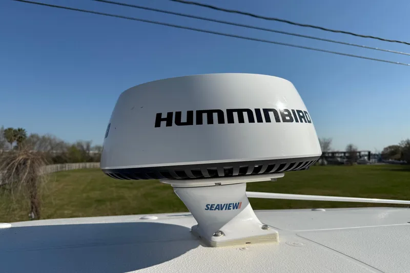 Slide: The Image of Humminbird radar on 2017 Sea Hunt BX 22 BR boat, clear sky background. - 20