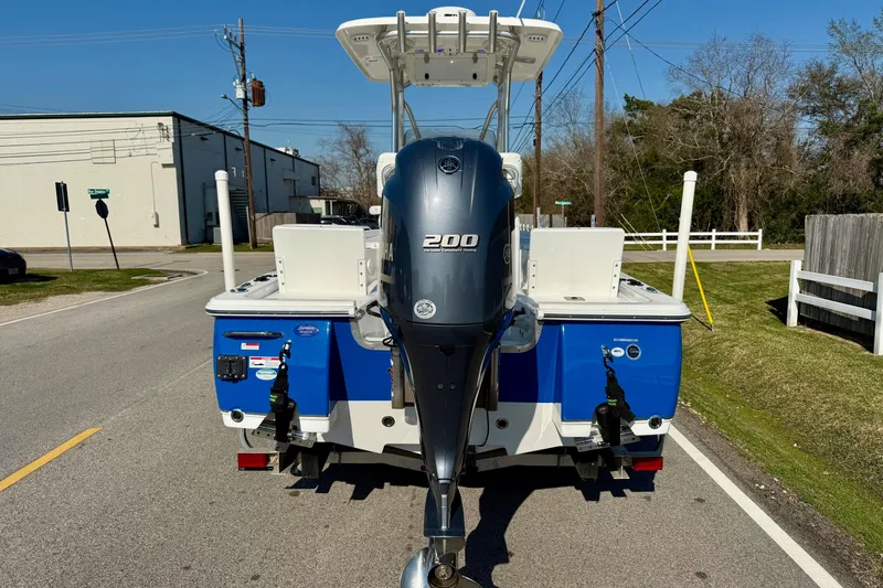 Slide: The Image of 2017 Sea Hunt BX 22 BR boat with Yamaha 200 engine on a sunny street. - 3
